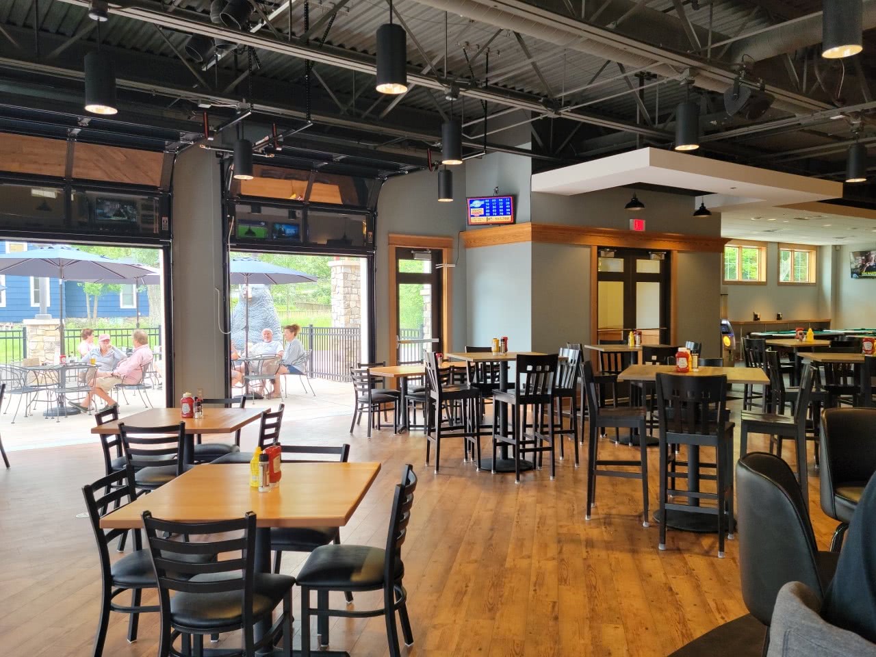 Restaurant Creates a Fresh Design with Open Garage Door Concept KB